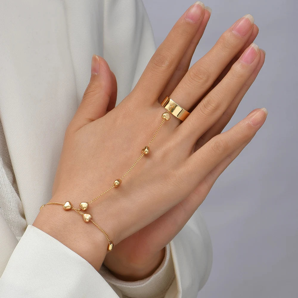 HeartLock Hand Harness – Gold Chain Ring Bracelet with Bold Elegance