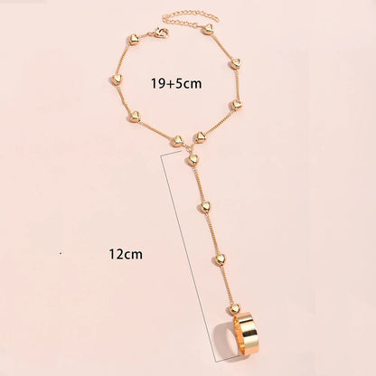 HeartLock Hand Harness – Gold Chain Ring Bracelet with Bold Elegance