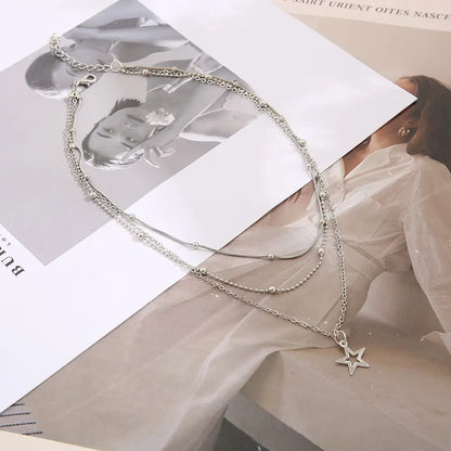 Celestial Drift – Multilayer Star & Moon Necklace Set