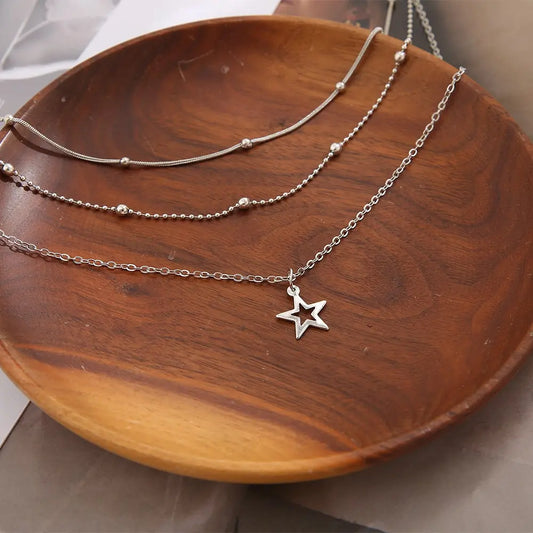 Celestial Drift – Multilayer Star & Moon Necklace Set