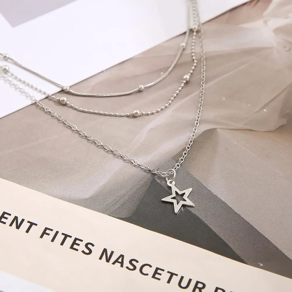 Celestial Drift – Multilayer Star & Moon Necklace Set